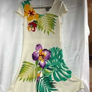 Spring dress by Taylor. Size 10 with 5%spandex. Super easy grab & go.